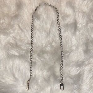 Silver tone purse chain. New in bag